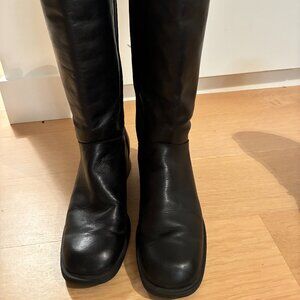 Black waterproof boots made by Santana of Canada